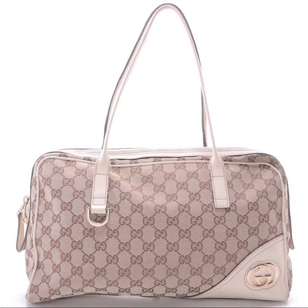 Gucci Britt Boston bag in GG Canvas and Leather.